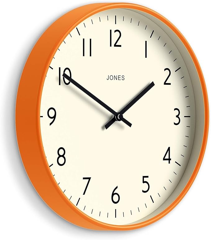JONES CLOCKS® Studio Wall Clock | Modern Round Clock | 12 inch | Orange | Easy to Read Numbers | Versatile Design for Kitchen, Living Room or Office